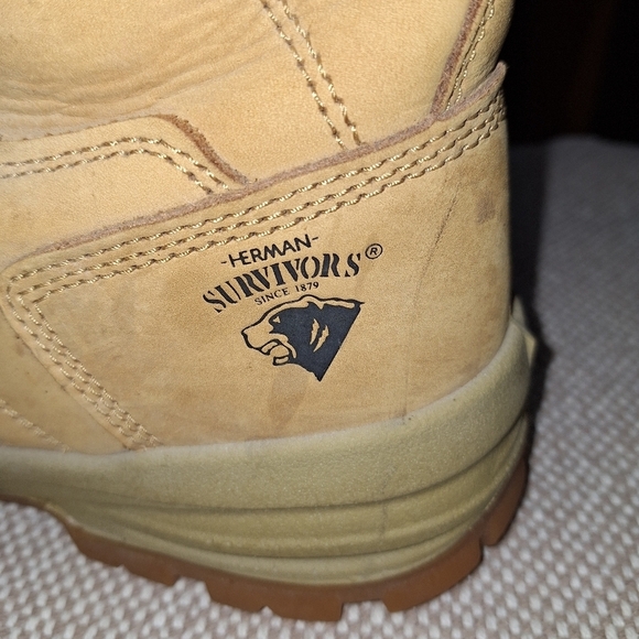 A pair of Herman Survivors leather boots in a men's size 11.5 Wide. Safety Toe. - Picture 3 of 12